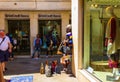 Hawkers selling handbags commercial street Venice Italy