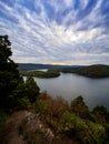 HawnÃ¢â¬â¢s Overlook of Raystown Lake in the mountains of Pennsylvania in the fall right before sunset with a dramatic blue swirly Royalty Free Stock Photo