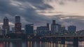 Hawthorne Bridge over Willamette River at sunset with skyline of downtown Portland, USA Royalty Free Stock Photo