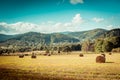 Hay bail harvesting Royalty Free Stock Photo