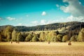 Hay bail harvesting Royalty Free Stock Photo
