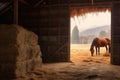 hay bale beside horse in a rustic barn setting Royalty Free Stock Photo