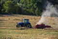 Hay baler in the field Royalty Free Stock Photo