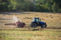 Hay baler in the field Royalty Free Stock Photo