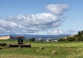 Hay Baler, Wheat Field, and Mt Hood in Dufur, Oregon, Taken in Summer Royalty Free Stock Photo