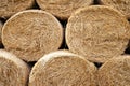 Hay bales. Close-up round hay bales stacked in stacks. Royalty Free Stock Photo