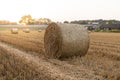 Hay bales on a farm field. Rural landscape after harvest. Royalty Free Stock Photo