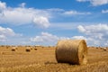 Hay bales on the field after harvest. Beautiful countryside landscape, rural nature in the farm land. Autumn, Harvesting concept Royalty Free Stock Photo