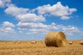 Hay bales on the field after harvest. Beautiful countryside landscape, rural nature in the farm land. Autumn, Harvesting concept Royalty Free Stock Photo