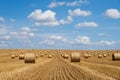 Hay bales on the field after harvest. Beautiful countryside landscape, rural nature in the farm land. Autumn, Harvesting concept Royalty Free Stock Photo