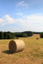 Hay bales on field in Saxon Switzerland Royalty Free Stock Photo