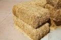 Hay Bales.  Piled stacks of dry straw collected for animal feed. Dry baled hay bales stack. Hay Bales piled up for Seating and Royalty Free Stock Photo