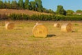 Hay bales rural landscape scene in summer.