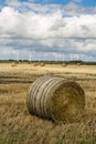 Hay bales, wind turbines, agriculture in northern Germany
