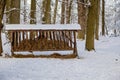 Hay feeder for deer and stags in the forest  the garden of medieval Castle Blatna in winter sunny day  Czech Republic Royalty Free Stock Photo