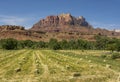 Hay Harvest Beneath Rugged Utah Mountains Royalty Free Stock Photo