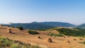 Hay stack on a hillside Royalty Free Stock Photo