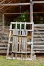 hay storage barn with green trees in the background Royalty Free Stock Photo