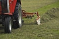 Hay turning machine in agriculture Royalty Free Stock Photo