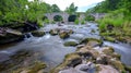 Waterfall and ford on the country lane near Pennant below Gospel Pass and Lord Hereford`s Knob, near Hay-on-Wye, Wales Royalty Free Stock Photo