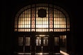 Haydarpasa train station`s main entrance into the light, the sun being filtered by art deco stained-glass