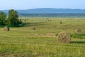 Haymaking, harvesting in the fields and hills Royalty Free Stock Photo