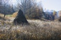 Haystack in the background of mountains Royalty Free Stock Photo