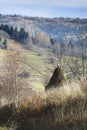haystack in the background of mountains Royalty Free Stock Photo
