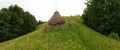 Haystack in field, Moieciu, Romania Royalty Free Stock Photo