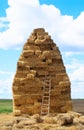 A haystack made of rectangular blocks of hay. Royalty Free Stock Photo