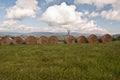 Haystacks on meadow near Malatina village in Slovakia Royalty Free Stock Photo