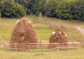 Haystacks, typical Romanian rural scene Royalty Free Stock Photo
