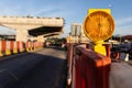 Hazard beacon light at highway construction site for traffic safety