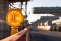 Hazard beacon light at highway construction site for traffic safety Royalty Free Stock Photo