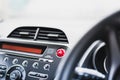 Hazard warning lights button on a car dashboard Royalty Free Stock Photo