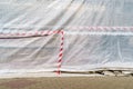 Hazard warning tape on construction site Royalty Free Stock Photo