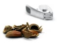 Hazel nut shells and cracker Royalty Free Stock Photo