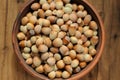 Hazel nuts in clay bowl Royalty Free Stock Photo