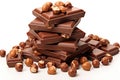 Hazelnut Chocolate Isolated, Stack of Pieces of Milk Chocolate with Whole Hazelnuts on White Royalty Free Stock Photo