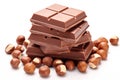 Hazelnut Chocolate Isolated, Stack of Pieces of Milk Chocolate with Whole Hazelnuts on White Royalty Free Stock Photo