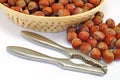 Hazelnut cracked open with nut cracker isolated Royalty Free Stock Photo