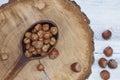 Hazelnut decorticated in a wooden spoon