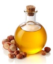 Hazelnut oil and hazelnuts Royalty Free Stock Photo