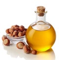 Hazelnut oil and hazelnuts Royalty Free Stock Photo