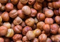 Hazelnut pile closeup. Hazelnut photo background. Organic food rustic banner template.