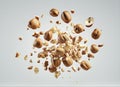 Hazelnut splash with cracked nuts isolated on white background Royalty Free Stock Photo