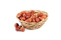 Hazelnuts in basket isolated on white. Royalty Free Stock Photo