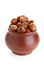 Hazelnuts in a clay pot