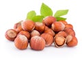 Hazelnuts with green leaves isolated on white background Royalty Free Stock Photo