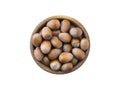 Hazelnuts isolated on white background. Hazelnuts in a bowl with copy space for text. Royalty Free Stock Photo